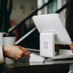 white monitor on desk